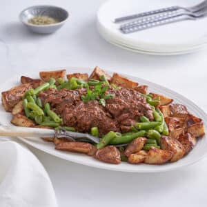 Braised Beef with Veggies and Baked Potato